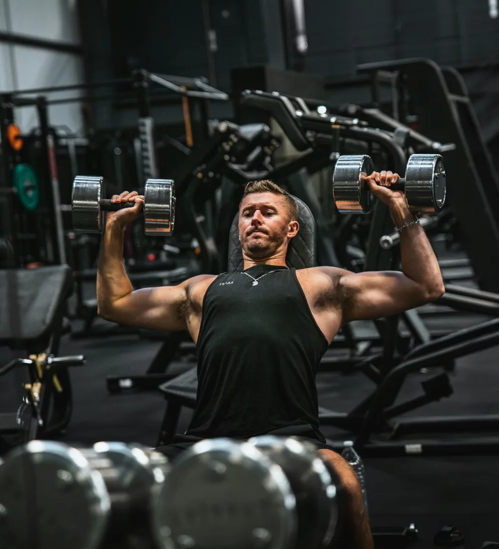 Member training with dumbbells