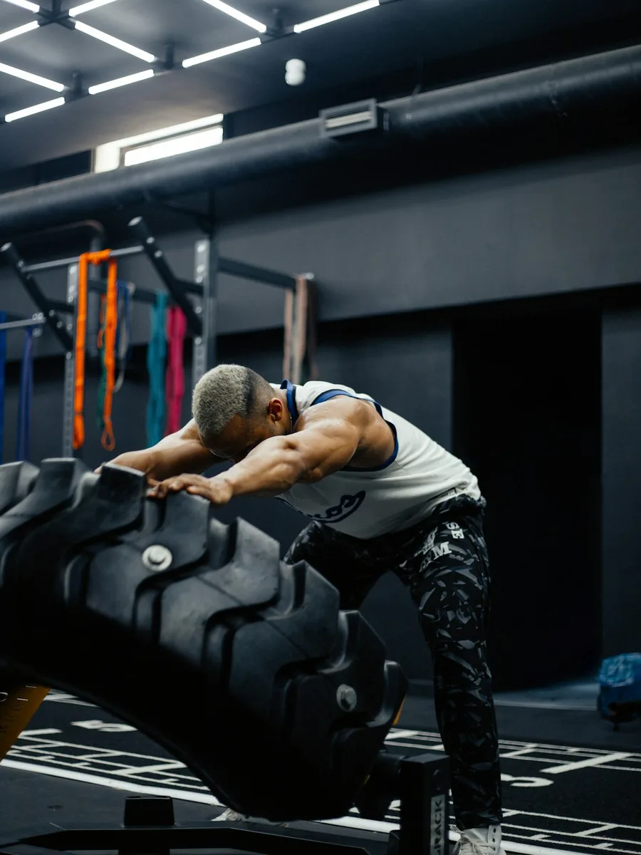 Athlete pushing a weighted sled